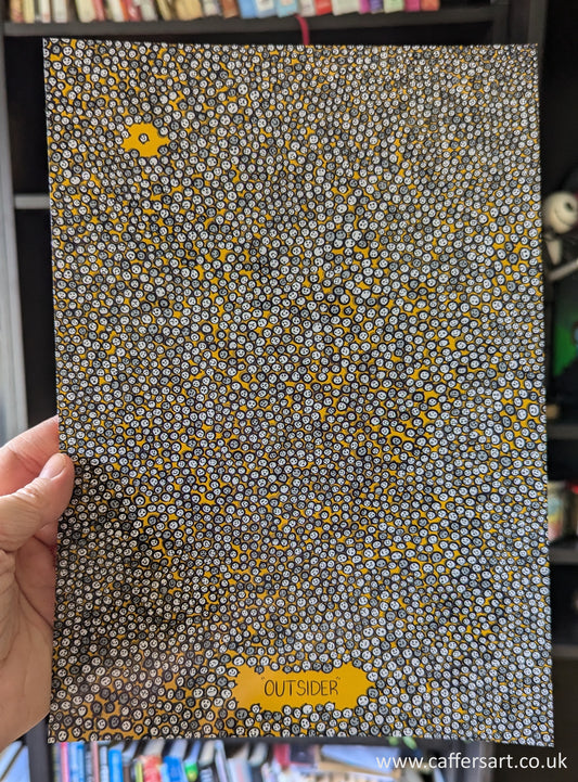 From a birdseye perspective: hundreds of tiny faces looking up with various expression on their faces. There is a gap in the crowd on the top left with a solitary face and another gap at the bottom with writing saying 'OUTSIDER' 